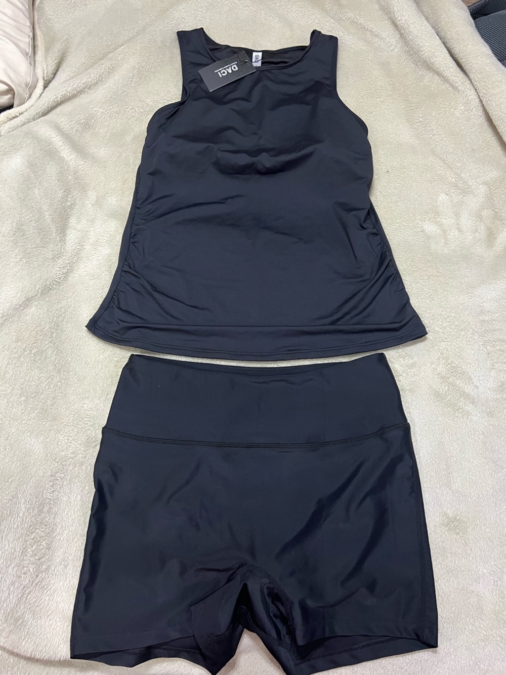 Daci Black swim top and High-Waist Tournesol swim shorts